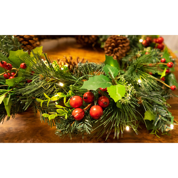 Red Co. Light-Up Christmas Spruce Wreath with Pinecones, Red Holly Berries and LED Lights, Solar Powered - 22 Inch